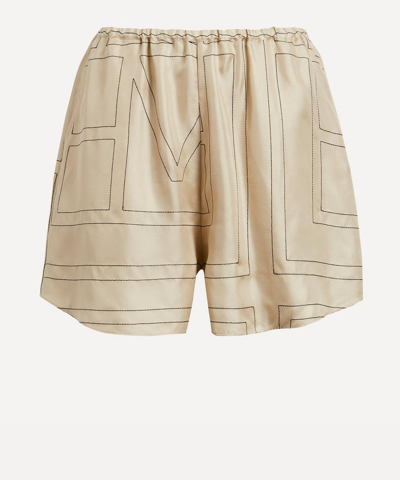 Shop Totême Monogram Silk Pyjama Shorts In Ivory