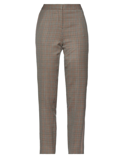 Shop Burberry Pants In Sand