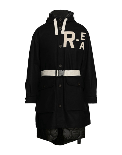 Shop Emporio Armani Coats In Black