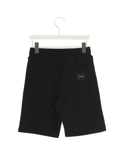 Shop Dolce & Gabbana Logo Plate Bermuda Shorts In Black