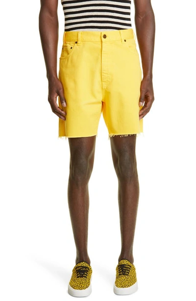 Shop Saint Laurent Stonewash Denim Baggy Shorts In 7040 - Bright Yellow