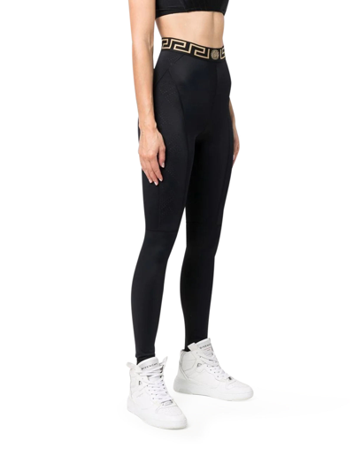 Shop Versace Greca Waistband Performance Leggings In Black