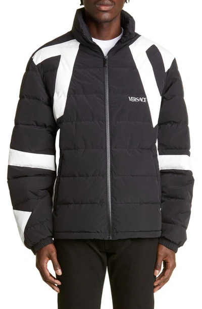 Shop Versace Grecca Print Quilted Down Jacket In Black/ White