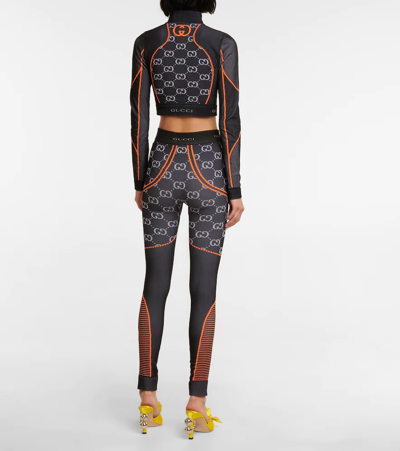 Shop Gucci Gg Jersey Jacquard Leggings In Black/orange