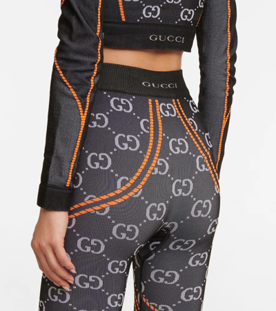 Shop Gucci Gg Jersey Jacquard Leggings In Black/orange