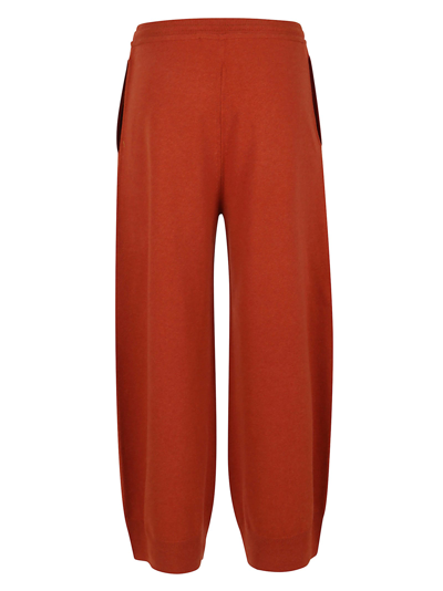 Shop Stella Mccartney Relaxed Cashmere Wardrobe Trousers Knit In Rust