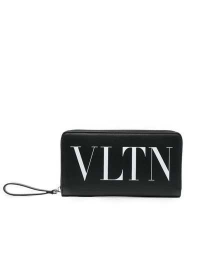 Shop Valentino Vltn Zipped Continental Wallet In Black