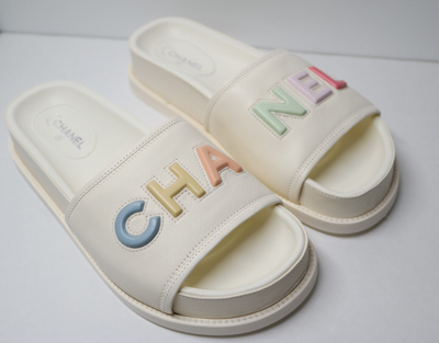 Shop CHANEL 2023 SS CHANEL CHA NEL LOGO BEIGE LEATHER FLAT SHOES