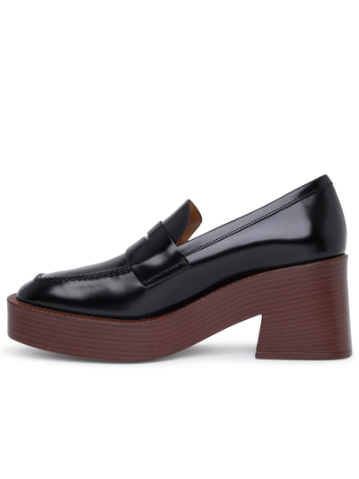 Shop Tod's Leather Platform Loafer In Black
