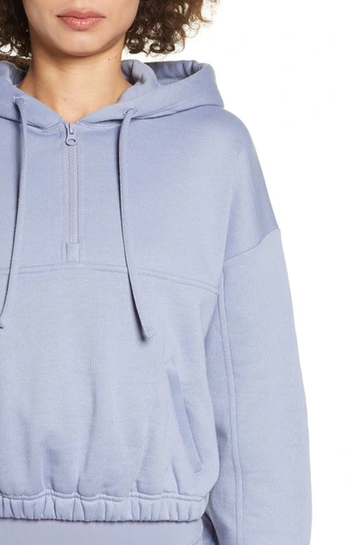 Shop Alo Yoga Stadium Quarter Zip Hoodie In Blue Moon