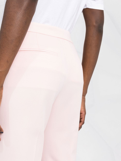 Shop Alexander Mcqueen Cropped Slim-cut Trousers In Rosa