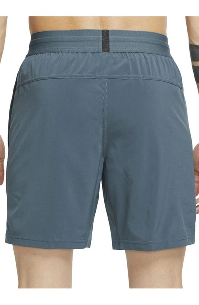 Shop Nike Dri-fit Flex Pocket Yoga Shorts In Ash Green/ Black