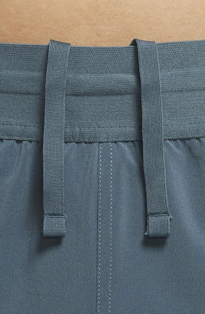 Shop Nike Dri-fit Flex Pocket Yoga Shorts In Ash Green/ Black