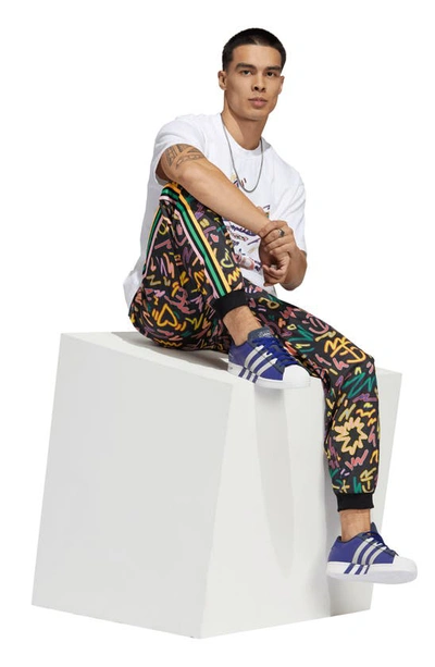 Shop Adidas Originals X Kris Andrew Unisex Love Unites Track Pants In Multicolor