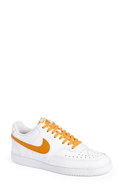 Shop Nike Court Vision Low Sneaker In White/ Curry