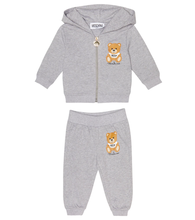 Shop Moschino Baby Set Of Logo Hoodie And Pants In Melange Grey