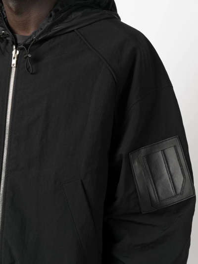Shop Juunj Long-sleeve Hooded Jacket In Black