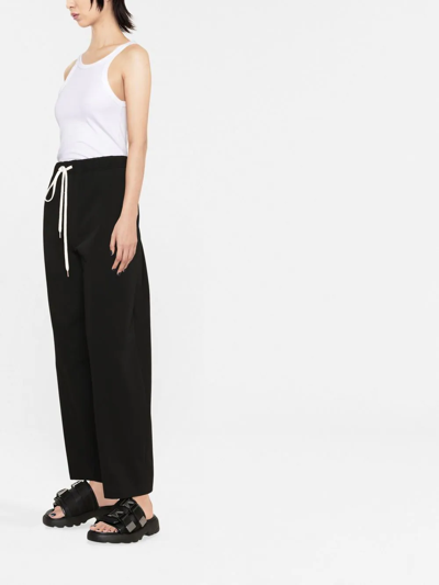 Shop Mm6 Maison Margiela Techno Track Pants In Black