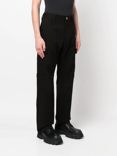 Shop Versace Straight-leg Trousers In Black