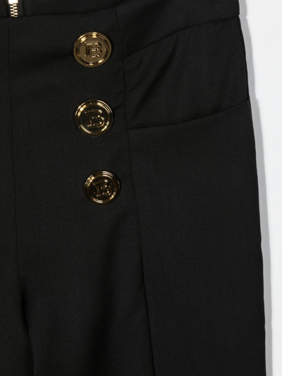 Shop Balmain Decorative Button Detail Trousers In Black