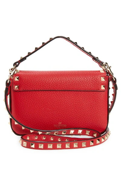 Shop Valentino Mini Rockstud Leather Top Handle Bag In Rouge Pur