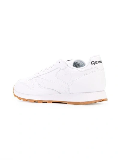Shop Reebok 'classic' Sneakers In White