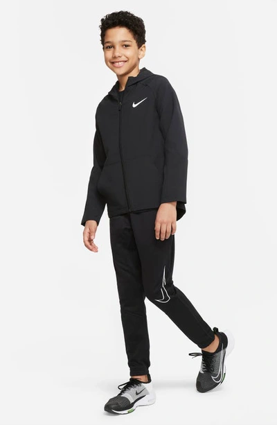 Shop Nike Kids' Dri-fit Woven Training Jacket In Black/ Black/ Black/ White