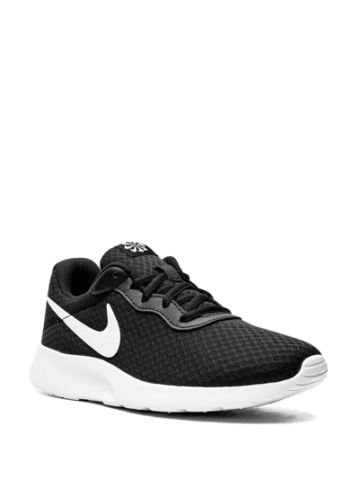 Shop Nike Tanjun Low-top Sneakers In Black