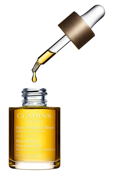 Shop Clarins Blue Orchid Radiance & Hydrating Face Treatment Oil