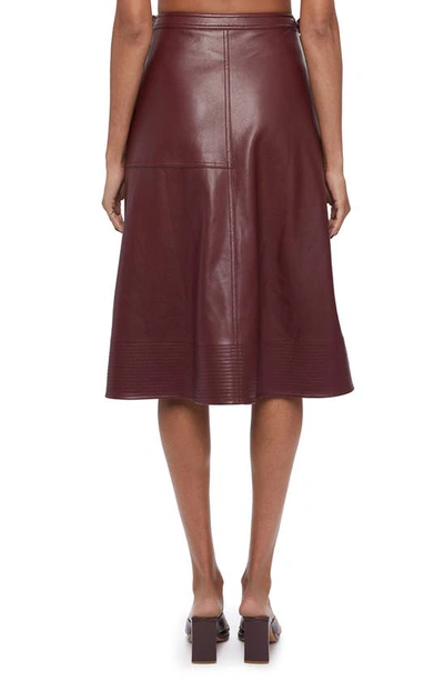 Shop Jonathan Simkhai Bia Faux Leather A-line Wrap Skirt In Merlot