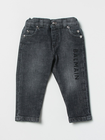 Shop Balmain Washed Denim Jeans In Black