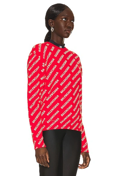 Shop Balenciaga All Over Logo Crewneck Sweater In Red & White