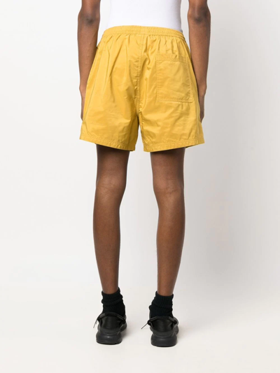 Pleasures Embossed Logo Bermuda Shorts In Yellow