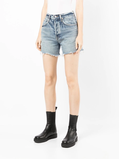 Shop Agolde Riley Cut-off Denim Shorts In Blue