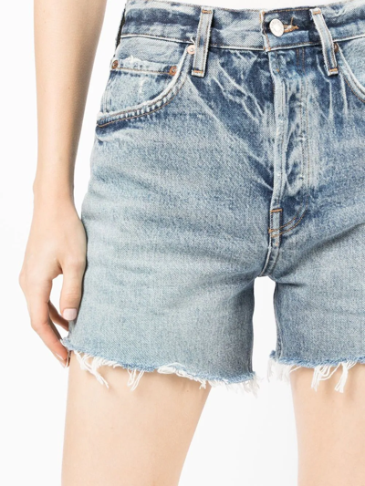 Shop Agolde Riley Cut-off Denim Shorts In Blue