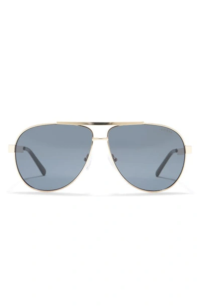 Shop Guess 62mm Aviator Sunglasses In Gold / Smoke