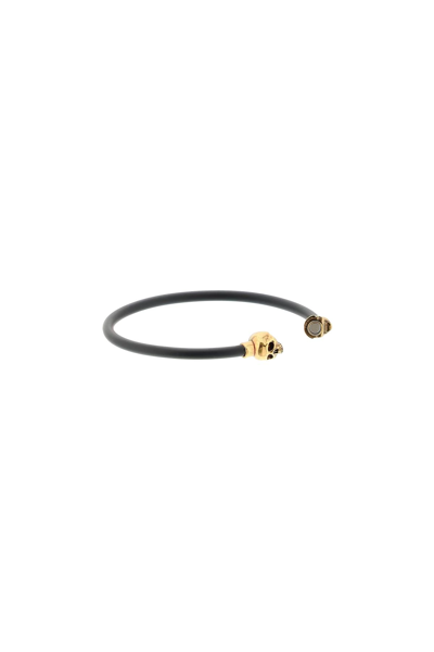 Shop Alexander Mcqueen Skull Rubber Bracelet In Black,gold