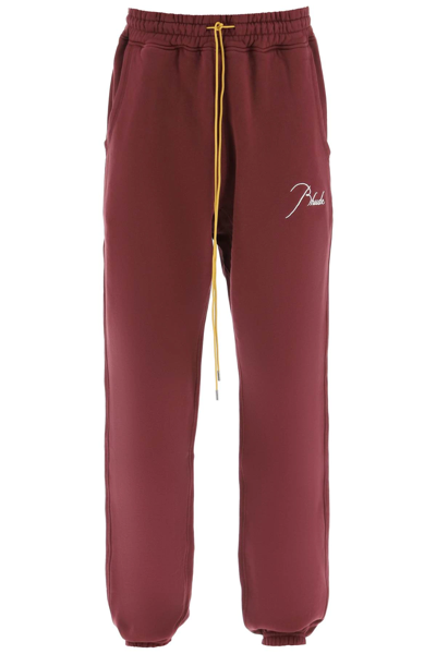 Shop Rhude Logo-embroidered Sweatpants In Red