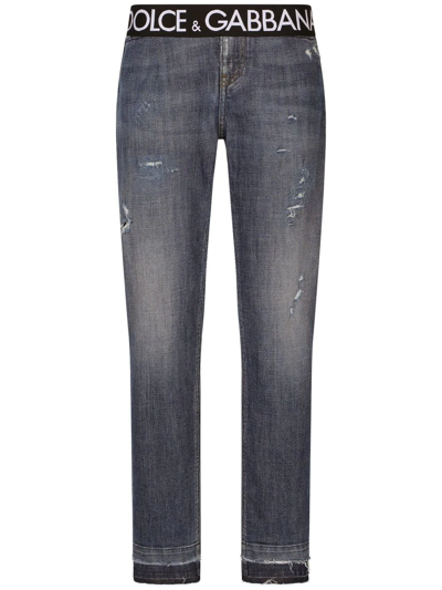 Shop Dolce & Gabbana Logo-waistband Slim-cut Jeans In Blue