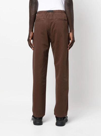Shop Gramicci Belted-waist Straight-leg Trousers In Brown