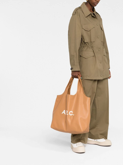 Shop Apc Logo-print Leather Tote Bag In Brown