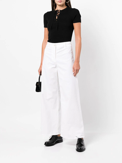 Shop Nili Lotan Megan Flared Cuff Trousers In White