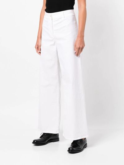 Shop Nili Lotan Megan Flared Cuff Trousers In White