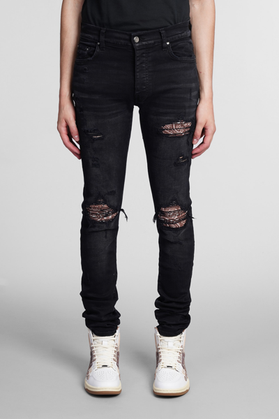 Shop Amiri Jeans In Black Denim