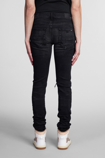 Shop Amiri Jeans In Black Denim