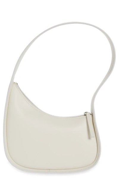 Shop The Row Half Moon Leather Bag In New Ivory