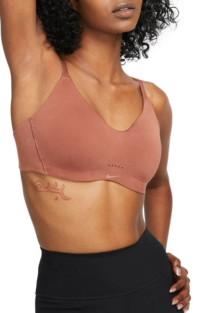 Shop Nike Minimalist Everyday Bra In Red Bark/ Red Bark/ Cacao Wow