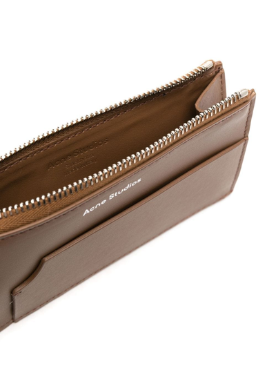Shop Acne Studios Logo Zipped Wallet In Brown