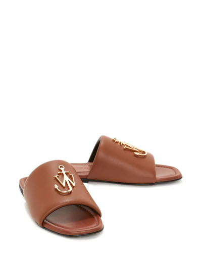 Shop Jw Anderson Jw Anchor Plaque Slide Sandals In Brown