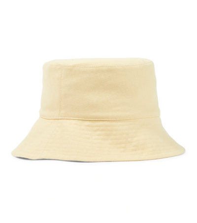 Shop Nanushka Canvas Bucket Hat In Crème